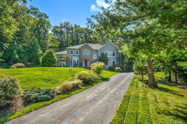 view of front of house with a front lawn