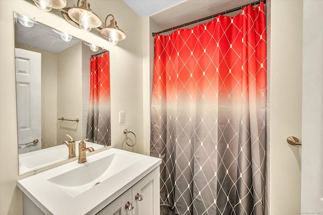 bathroom with vanity and a shower with shower curtain