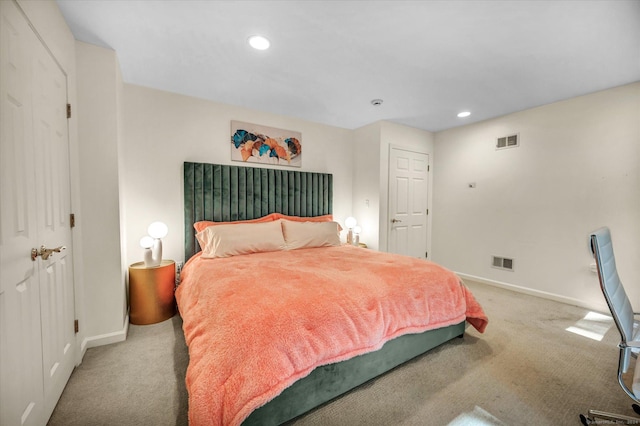 carpeted bedroom with a closet