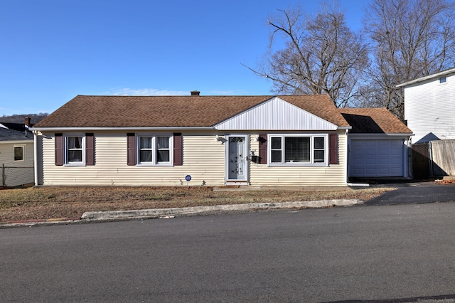 single story home featuring a garage