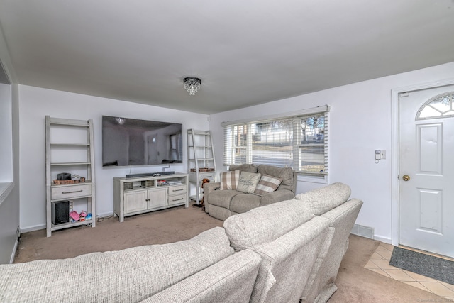 living room featuring light carpet