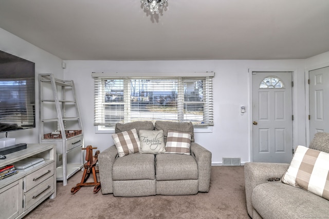 living room with light colored carpet