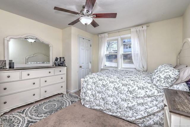 bedroom featuring carpet and ceiling fan