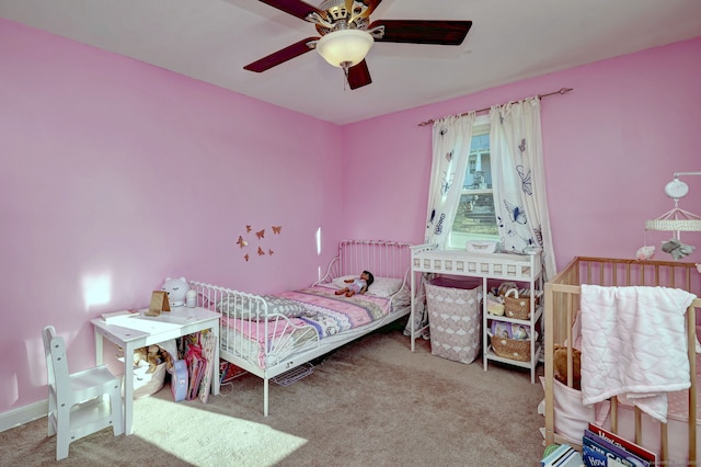 bedroom with carpet flooring and ceiling fan