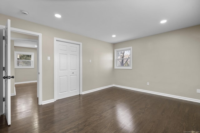 interior space with dark hardwood / wood-style flooring