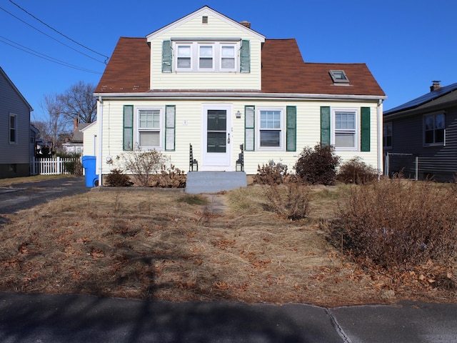 view of new england style home