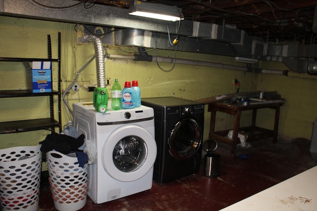 laundry area with washer and clothes dryer