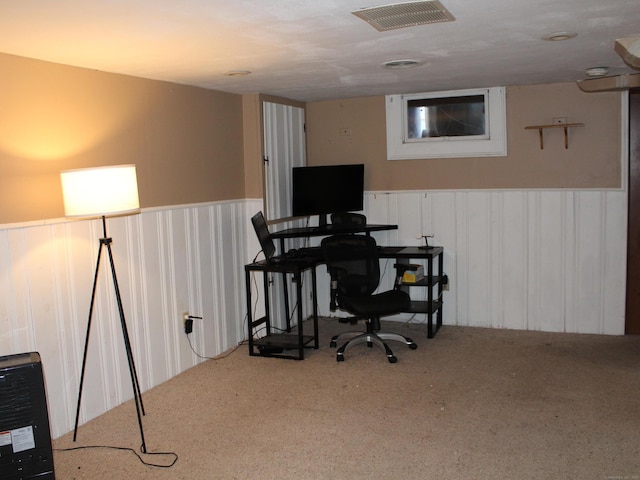 home office with carpet flooring