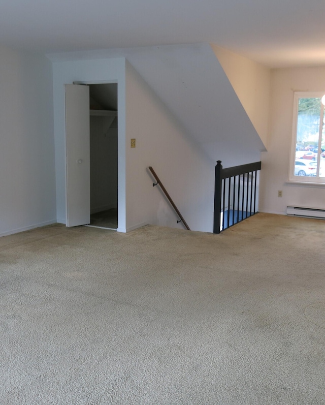 interior space featuring carpet and a baseboard radiator