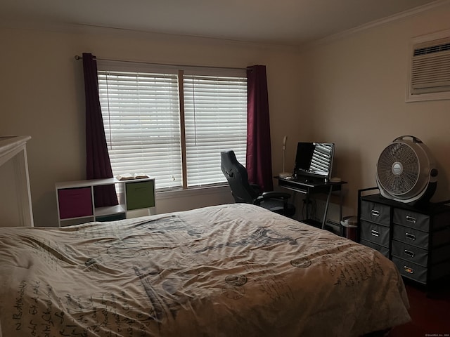 bedroom with a wall mounted AC and crown molding