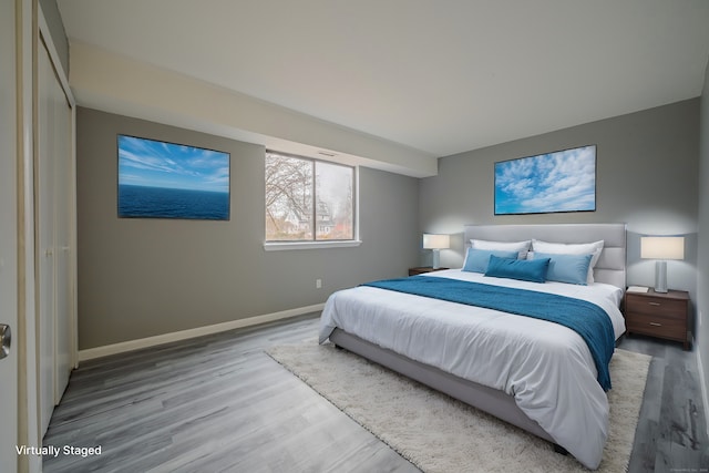 bedroom featuring light wood-type flooring