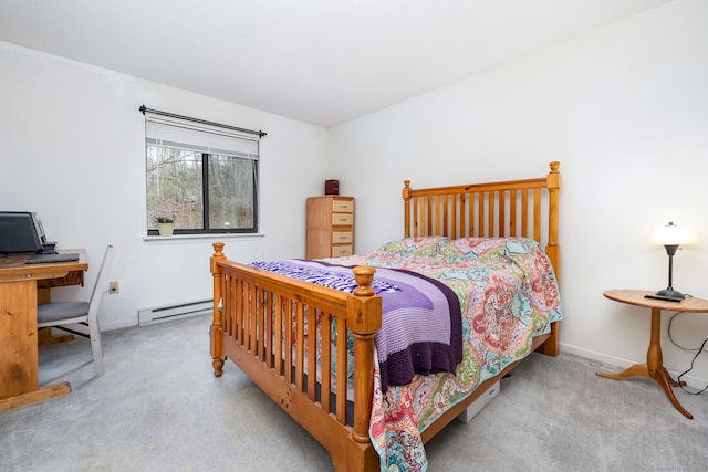 bedroom with a baseboard radiator and light carpet