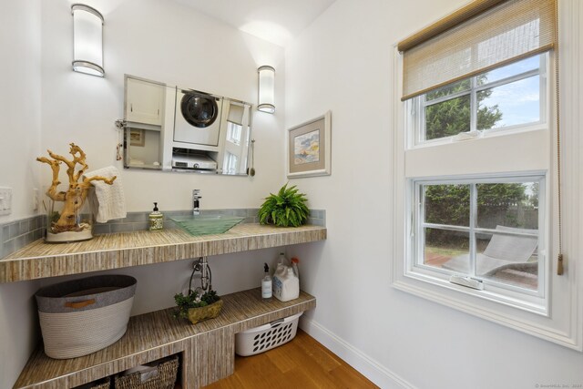 bathroom with sink and hardwood / wood-style flooring