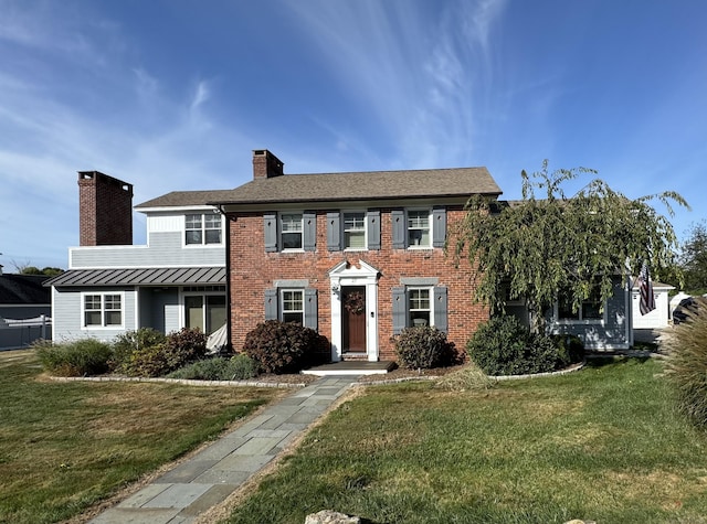 view of front of house with a front lawn