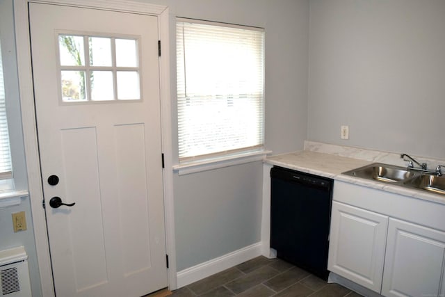 kitchen with dishwasher, white cabinets, a wealth of natural light, and sink