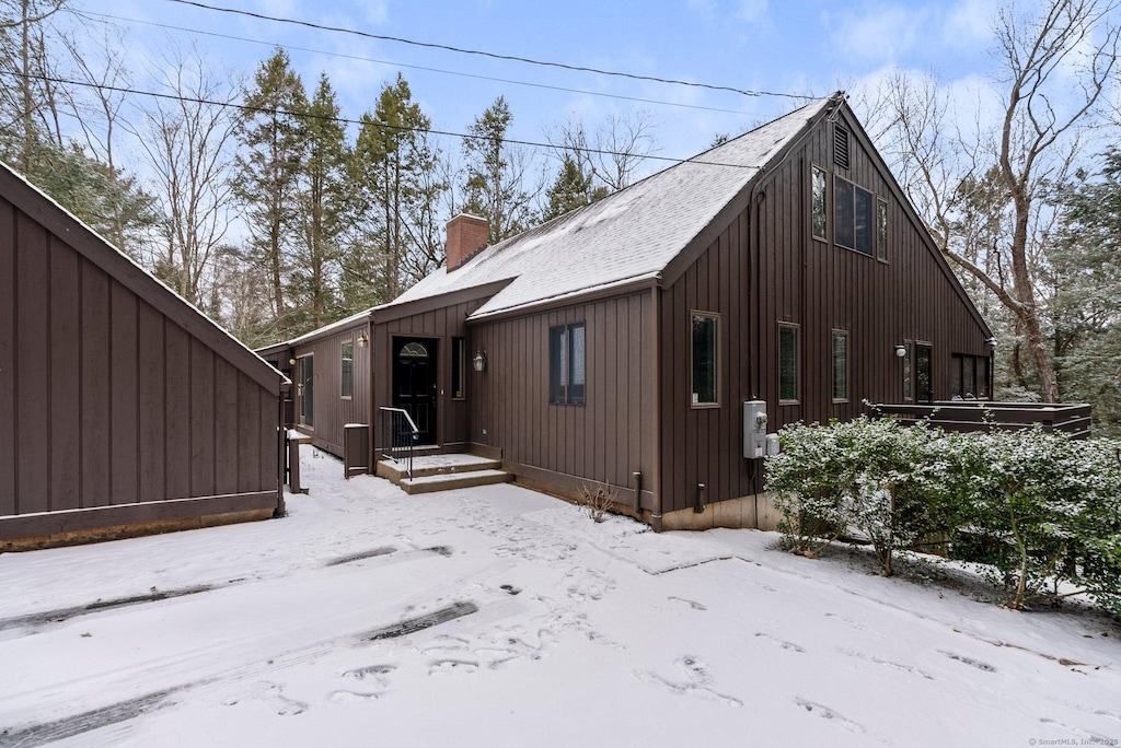 view of snow covered property