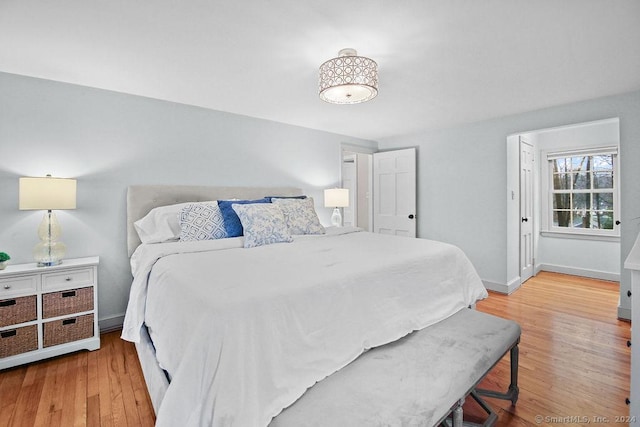 bedroom featuring wood-type flooring