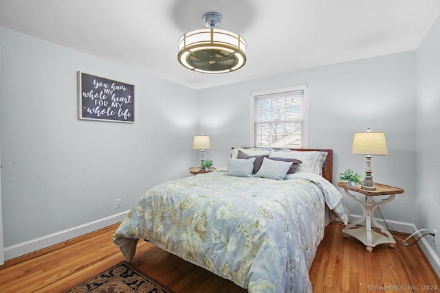 bedroom featuring hardwood / wood-style floors