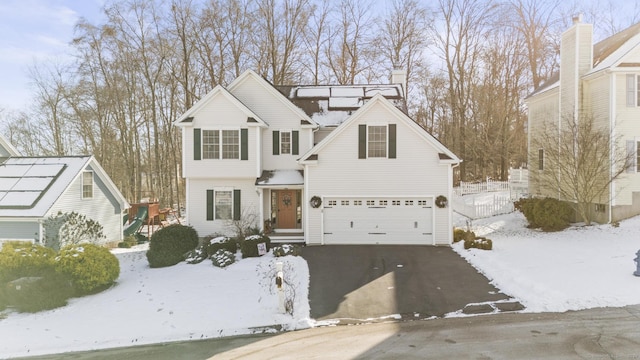 view of front property with a garage