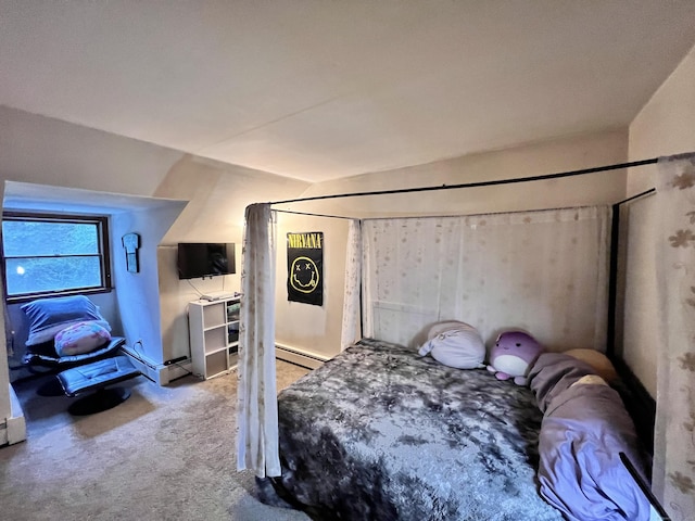 bedroom with light carpet and baseboard heating