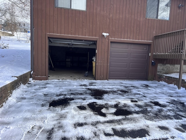 view of snow covered garage