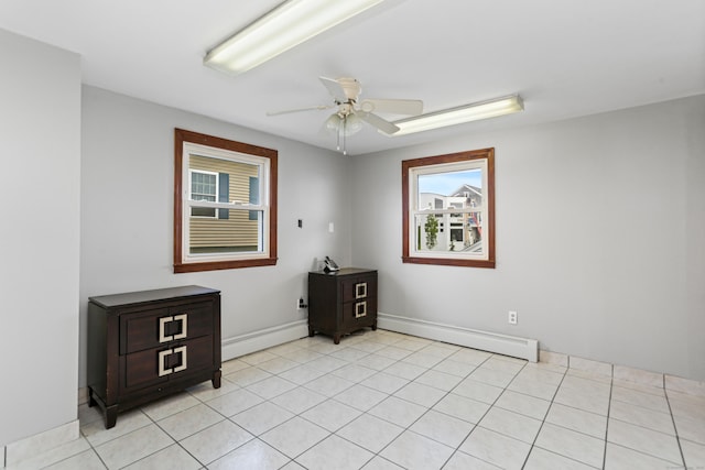 44 Washington Pkwy, Stratford, CT 06615 - unfurnished room featuring a baseboard heating unit, baseboards, and ceiling fan