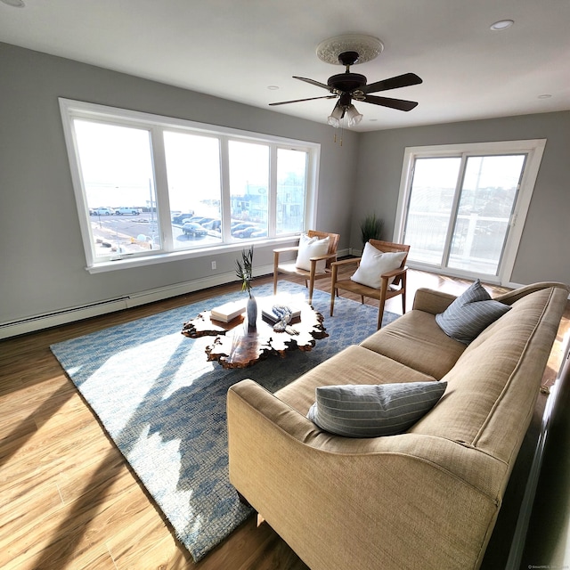 44 Washington Pkwy, Stratford, CT 06615 - living room with recessed lighting, wood finished floors, a wealth of natural light, and ceiling fan
