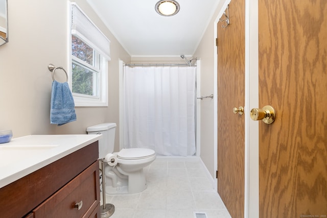 bathroom featuring vanity, a shower with curtain, tile patterned floors, and toilet