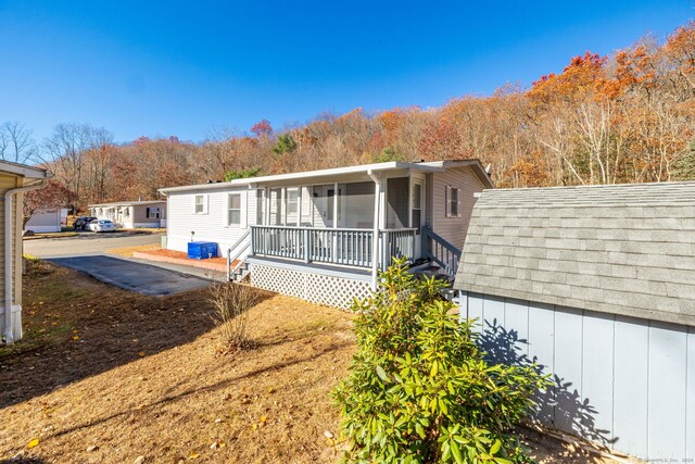 exterior space featuring covered porch