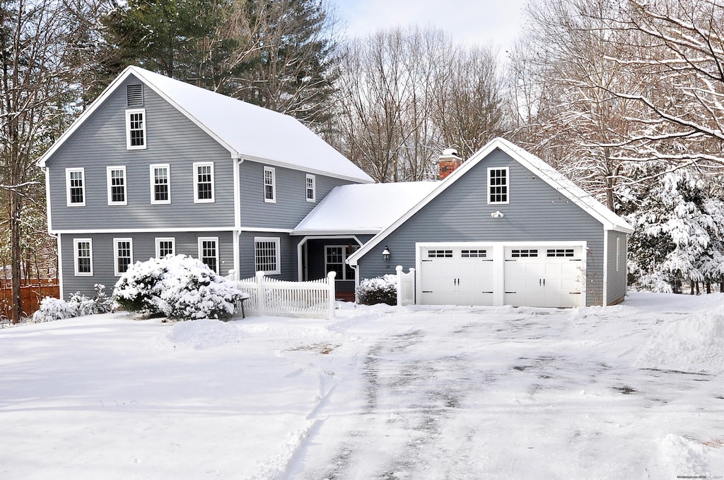 view of front of property featuring a garage