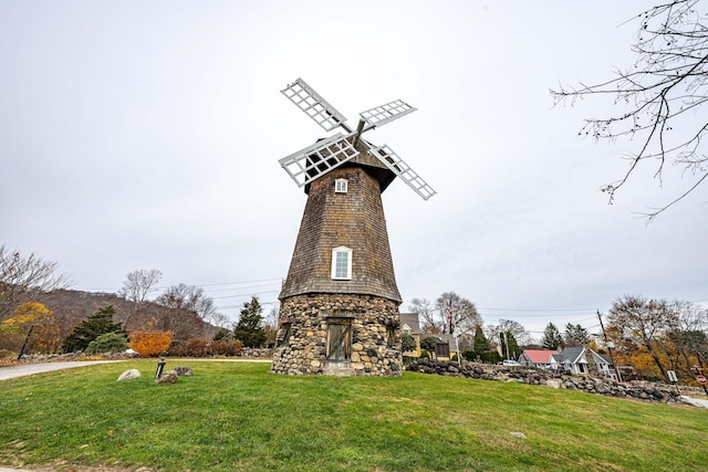 surrounding community with a lawn