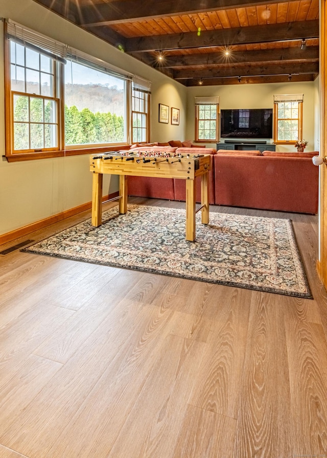 playroom featuring wood ceiling, beam ceiling, and hardwood / wood-style flooring