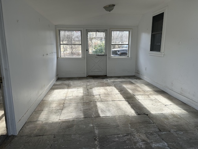 interior space featuring vaulted ceiling