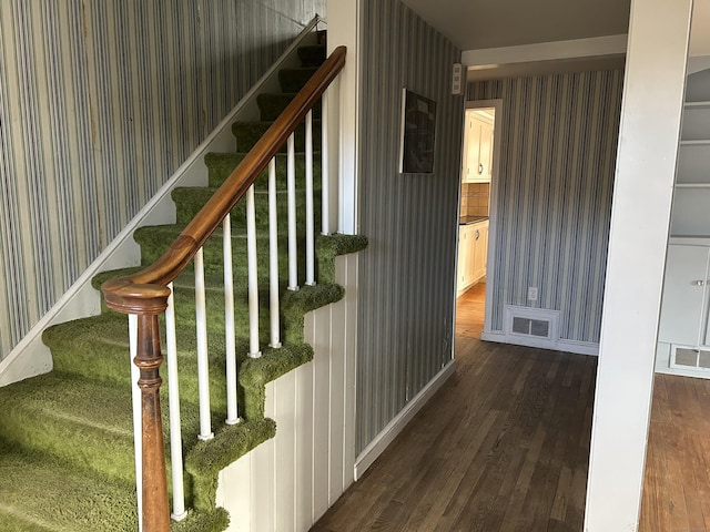 128 Main St S, Bridgewater, CT 06752 - stairway featuring wallpapered walls and wood finished floors