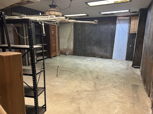 basement with a drop ceiling