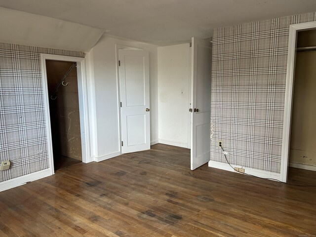 128 Main St S, Bridgewater, CT 06752 - unfurnished bedroom featuring wood finished floors and wallpapered walls