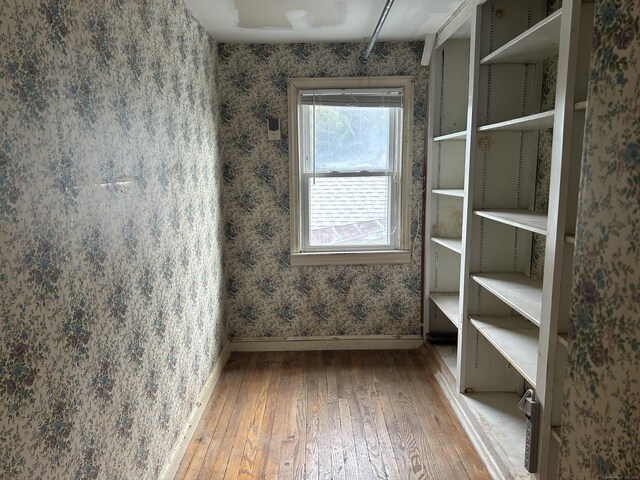 128 Main St S, Bridgewater, CT 06752 - unfurnished room with hardwood / wood-style flooring and wallpapered walls