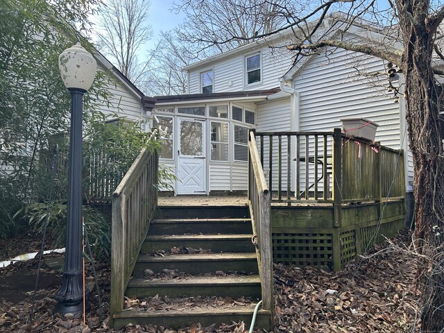 128 Main St S, Bridgewater, CT 06752 - back of house with a sunroom, a wooden deck, and stairs