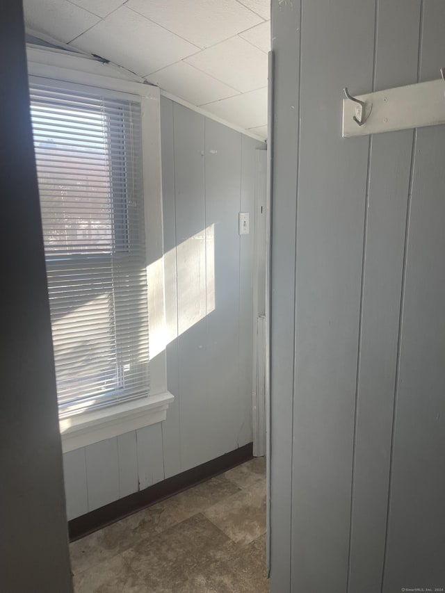 hallway featuring lofted ceiling