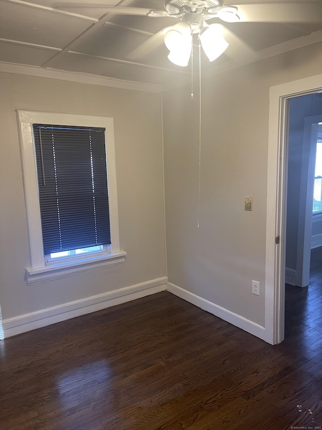 empty room featuring dark hardwood / wood-style floors and ceiling fan