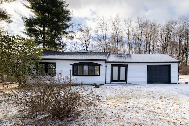 single story home with a garage