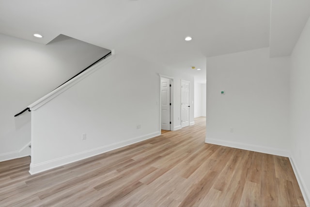 unfurnished living room featuring light wood-type flooring