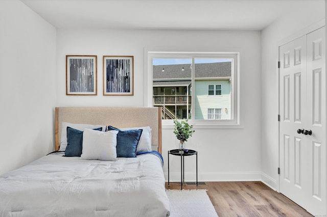 bedroom featuring light hardwood / wood-style flooring