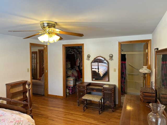 bedroom featuring ceiling fan and hardwood / wood-style flooring