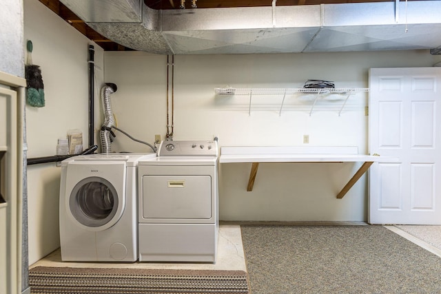 laundry room featuring washing machine and dryer