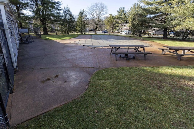 exterior space featuring a lawn and a patio