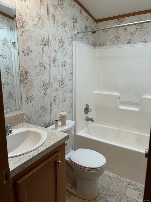 full bathroom featuring vanity, shower / bathtub combination, toilet, and crown molding