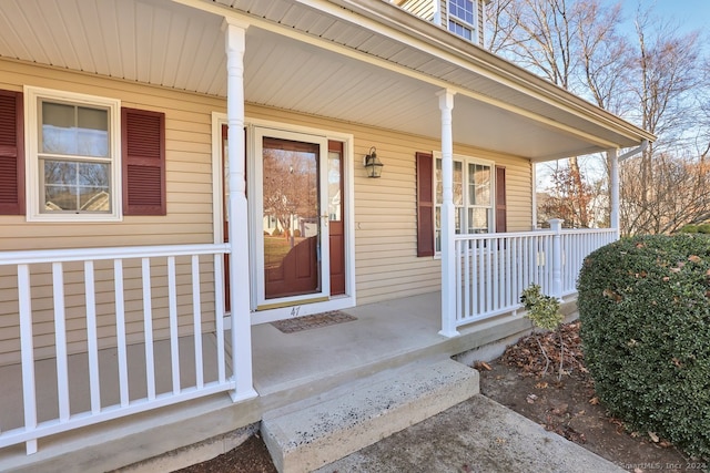 doorway to property with covered porch