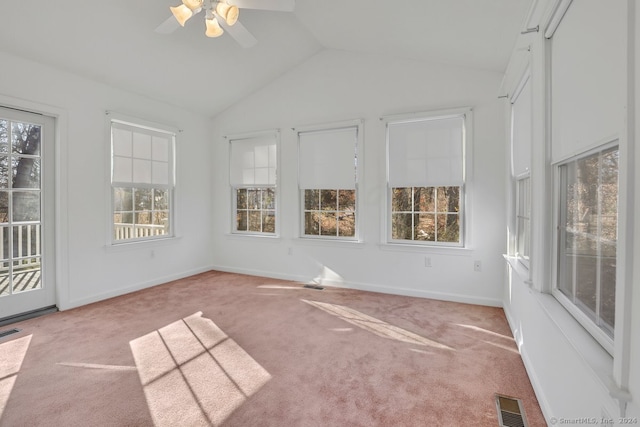 unfurnished sunroom with vaulted ceiling and ceiling fan