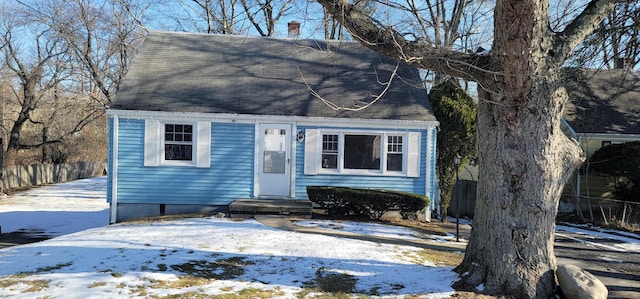 view of new england style home